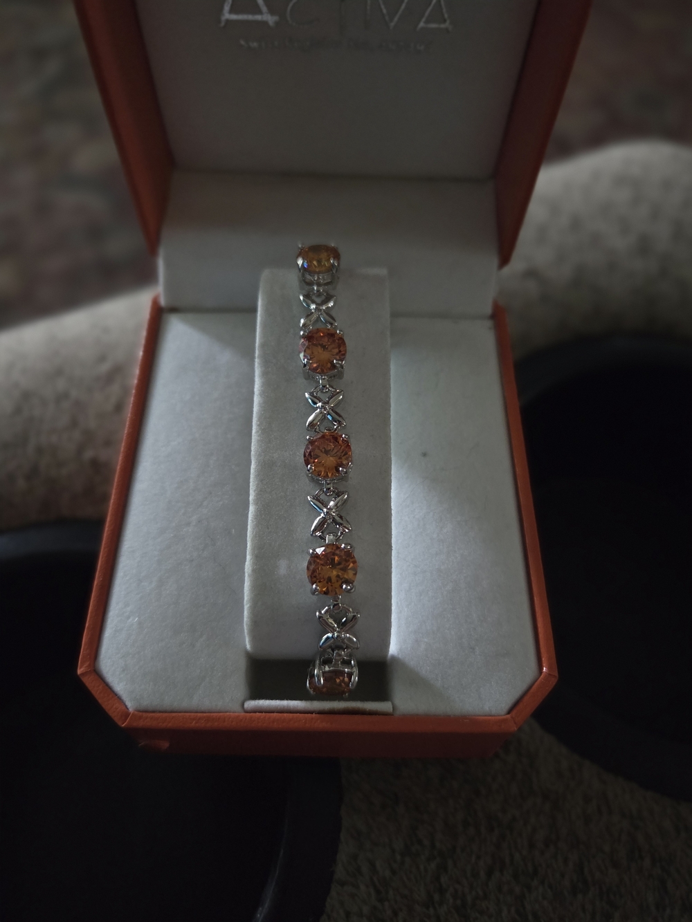 Sterling Silver Bracelet with Orange Gemstones